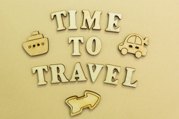 Figures of the airplane, car and ship, the inscription "time to travel".