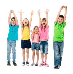 joyful laughing children with hands up in colorful clothes isolated on white background