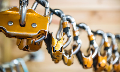carabiners for climbers hung on a rope closeup