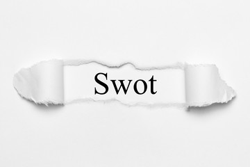 Swot on white torn paper
