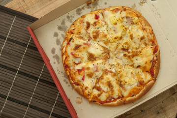 Pizza on wood table.