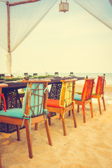 Table and chair set on the beach for dinner