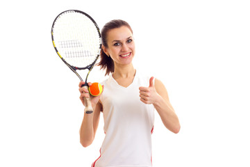 Woman with tennis racquet and ball