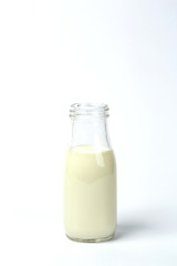 Fresh bottle of milk isolated over white background