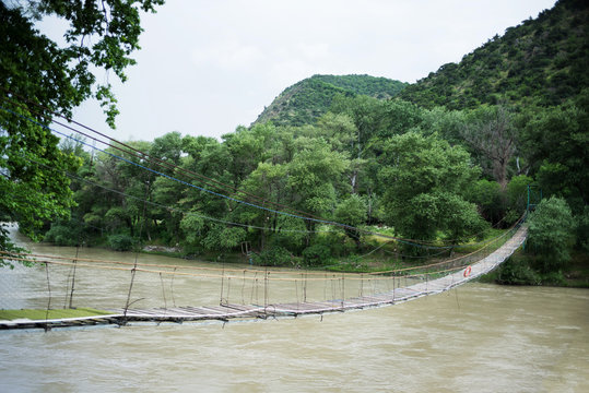 Fototapeta Suspension bridge in Georgia