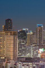 Fototapeta na wymiar Cityscape with light show from building of Bangkok