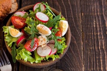Salad of Arugula, Radishes, Tomatoes and Eggs With Vegetable Seasoning