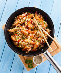 Chicken meat with rice wok