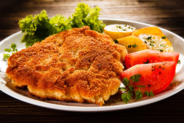 Fried pork chop with potatoes