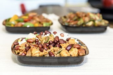 Delicious Chinese food with rice, beans and meat