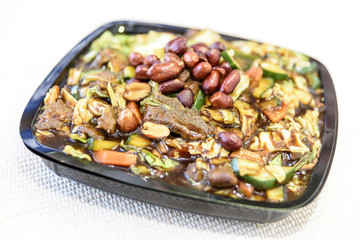 Delicious Chinese food with rice, beans and meat