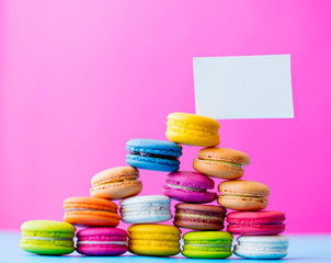 colorful macaroons and card