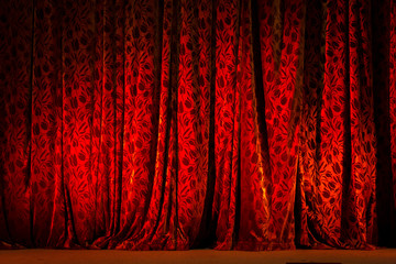 Red Theater Curtain illuminated with spot light