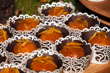 Group of brown cupcakes on the table, sweet dessert background