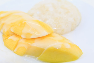 Thai dessert mango on sticky rice and coconut milk