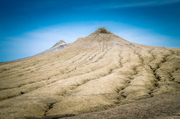 Muddy volcanoes, Buzau county, Romania. Active mud volcanoes landscape in Europe.