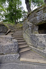 Fototapeta na wymiar Wooden steps in the rock