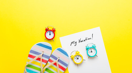 paper My Vacation, alarm clocks and sandals