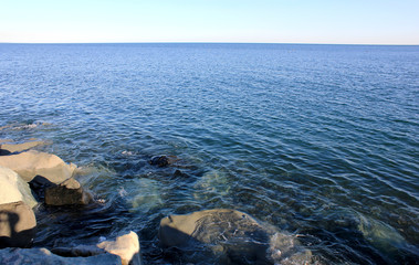 Rocky shore of calm sea.