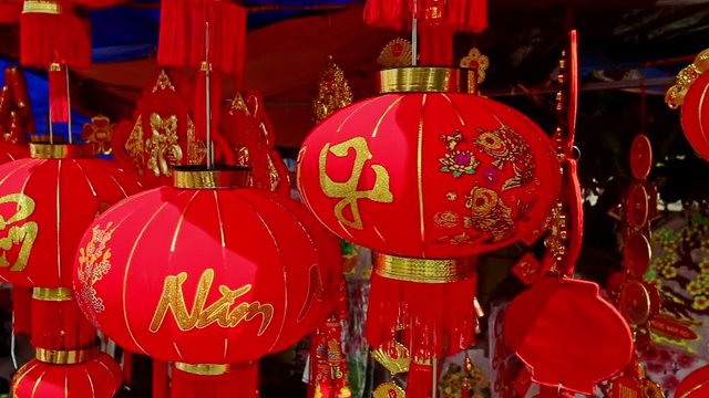Closeup Wind Shakes Large Chinese Lanterns on Street Market in City