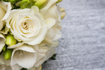 Obraz na płótnie Canvas Wedding bouqet made with white decorative flowers.