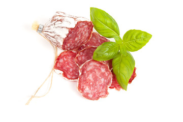 Salami sliced on the white background