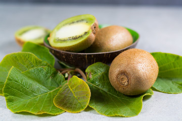 Tropical ripe organic kiwi fruit with leaves ready to eat