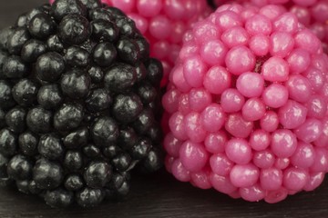 Jelly candies on a background. Pile of multiple different candies. Risk of obesity and tooth decay.