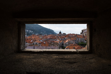 Fototapeta na wymiar Looking out of Dubrovnik's city walls