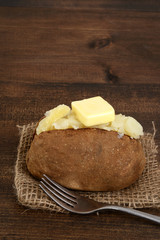 rustic baked potato with butter
