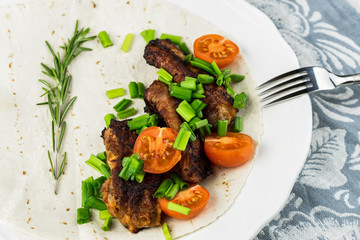 Tasty grilled ribs with vegetable. fried ribs with vegetables