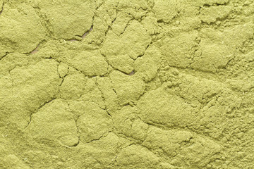 Leaves and moringa powder on wood (long moringa)