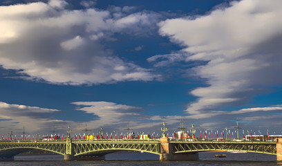 Trinity bridge in May with Victory day decorations above Neva river. Blue sky with clouds. Saint Petersburg, Russia.