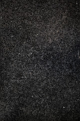 Fototapeta premium Modern black stone floor close up background.