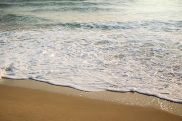 Photograp of small wave in beautiful sunlight.