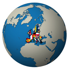 european union territory with flags over globe map