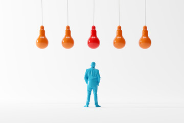 Business man looking lightbulbs look different concept idea. business minimal idea.