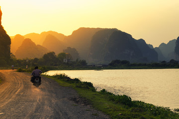 Dirt road with Motorbike Vietnam