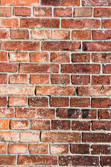 Old orange brick wall texture, close-up, background