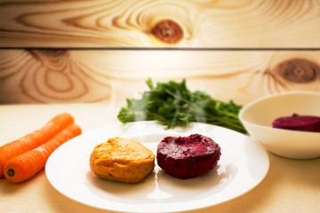 Fried carrot and beetroot cutlets. The concept of a healthy diet. Tasty and healthy food. Vegetarian cuisine.
