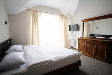 Fototapeta na wymiar Interior of a hotel bedroom