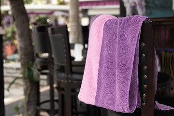 Towel beach on the bar chair. Tropical island Bali, Indonesia.