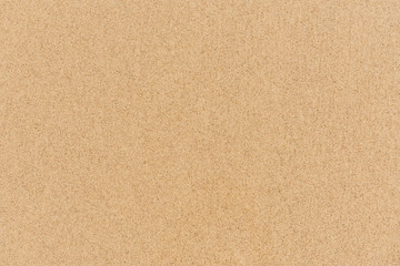 Fototapeta na wymiar Sand Texture. Brown sand. Background from fine sand. Sand background.