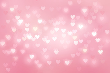 Heart bokeh on pink background