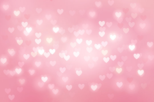 Heart bokeh on pink background