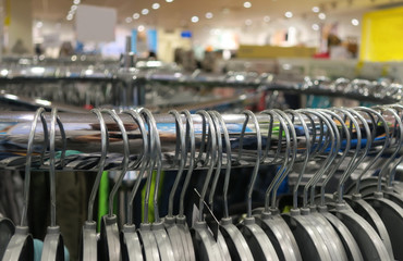 Fototapeta premium Clothes hangers in a shop