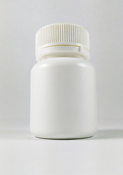 Empty White Medicine Bottle
