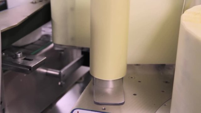 Labeling Machine in a Production Line of a Factory