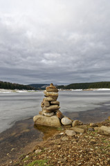 Close shot of the piled up of stones in snow