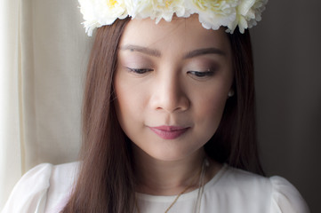 Female model wearing a flower crown